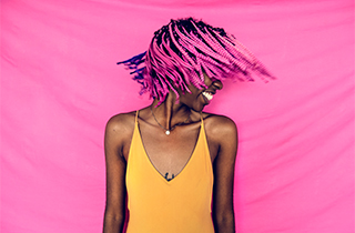 girl-shaking-her-pink-braided-hair-PQ2XN6P